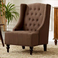 Poltrona Wingback con Schienale Trapuntato e Telaio in Legno Massello
